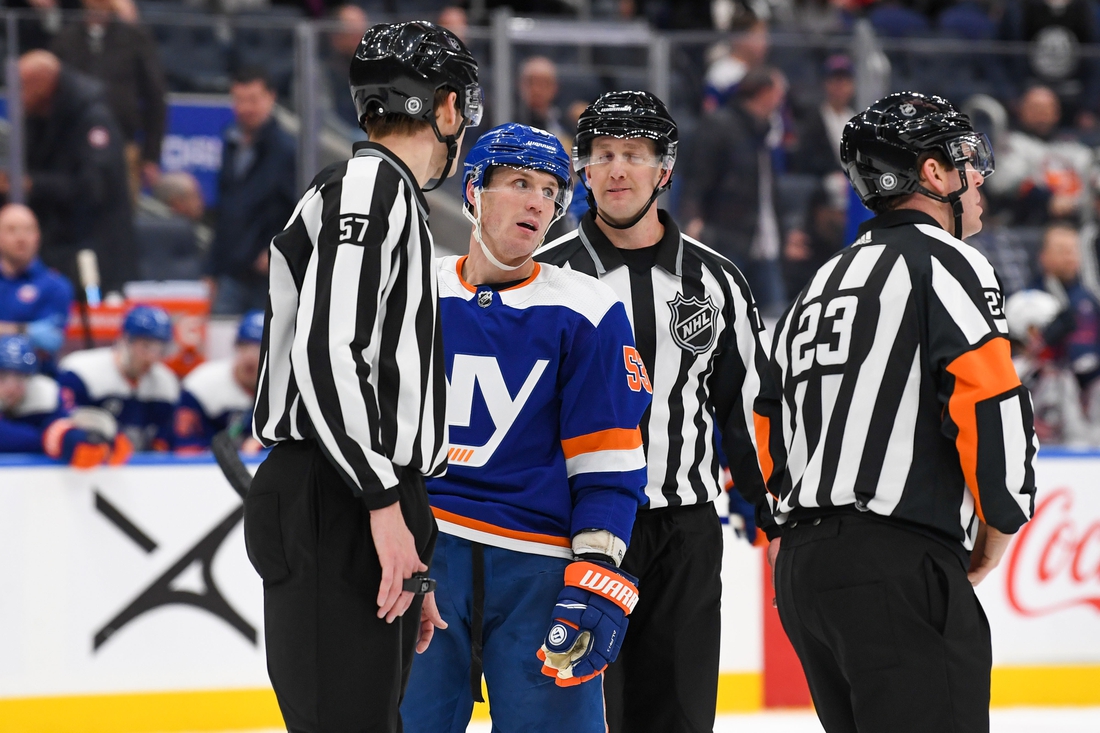 Mar 10, 2022; Elmont, New York, USA; New York Islanders center Casey Cizikas (53) reacts after with a high sticking call during the game against the Columbus Blue Jackets during the second period at UBS Arena. Mandatory Credit: Dennis Schneidler-USA TODAY Sports