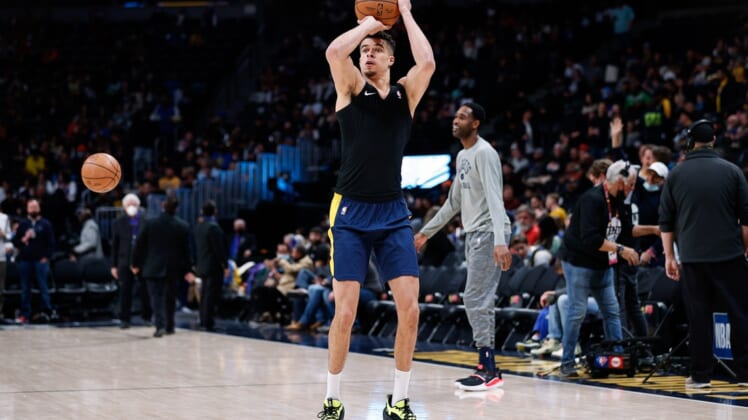 Mar 10, 2022; Denver, Colorado, USA; Denver Nuggets forward Michael Porter Jr. (1) warms up before the game against the Golden State Warriors at Ball Arena. Mandatory Credit: Isaiah J. Downing-USA TODAY Sports