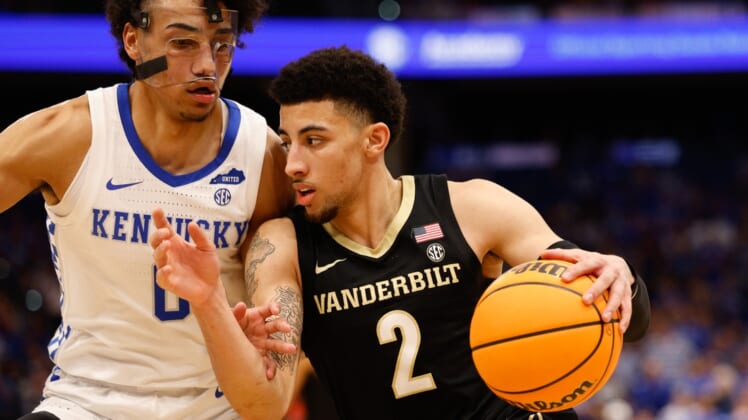 Mar 11, 2022; Tampa, FL, USA; Vanderbilt Commodores guard Scotty Pippen Jr. (2) drives to the basket while guarded by Kentucky Wildcats forward Jacob Toppin (0) in the second half at Amelie Arena. Mandatory Credit: Nathan Ray Seebeck-USA TODAY Sports