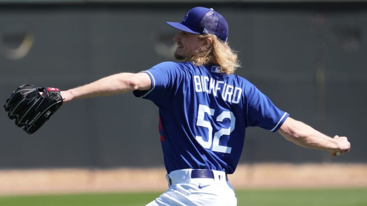 Mar 13, 2022; Glendale, AZ, USA; Los Angeles Dodgers Phil Bickford throws during a spring training workout at Camelback Ranch. Mandatory Credit: Joe Camporeale-USA TODAY Sports