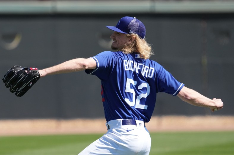 Mar 13, 2022; Glendale, AZ, USA; Los Angeles Dodgers Phil Bickford throws during a spring training workout at Camelback Ranch. Mandatory Credit: Joe Camporeale-USA TODAY Sports
