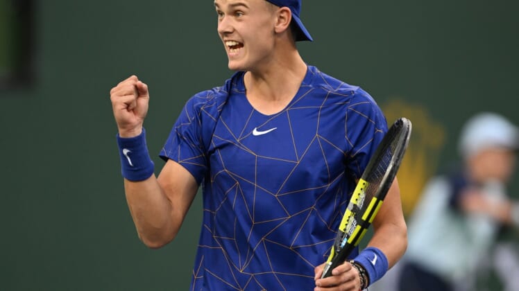 Mar 13, 2022; Indian Wells, CA, USA;  Holger Rune (DEN)  celebrates after winning a point against Matteo Berrettini (ITA) during his third round match at the BNP Paribas Open at the Indian Wells Tennis Garden. Mandatory Credit: Jayne Kamin-Oncea-USA TODAY Sports