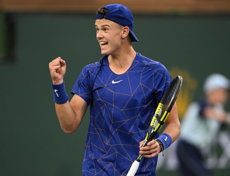 Mar 13, 2022; Indian Wells, CA, USA;  Holger Rune (DEN)  celebrates after winning a point against Matteo Berrettini (ITA) during his third round match at the BNP Paribas Open at the Indian Wells Tennis Garden. Mandatory Credit: Jayne Kamin-Oncea-USA TODAY Sports
