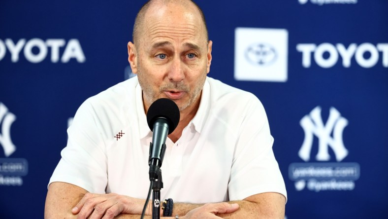 Mar 14, 2022; Tampa, FL, USA; New York Yankees general manager Brian Cashman talks with media during spring training workouts at George M. Steinbrenner Field. Mandatory Credit: Kim Klement-USA TODAY Sports