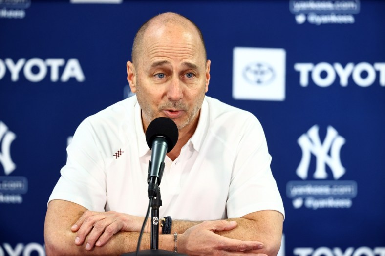 Mar 14, 2022; Tampa, FL, USA; New York Yankees general manager Brian Cashman talks with media during spring training workouts at George M. Steinbrenner Field. Mandatory Credit: Kim Klement-USA TODAY Sports