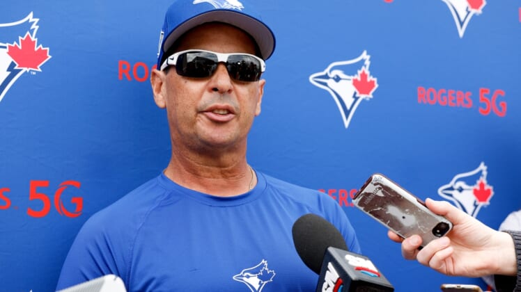 Mar 16, 2022; Dunedin, FL, USA; Toronto Blue Jays manager Charlie Montoyo (25) gives a press conference after workouts at Toronto Blue Jays Player Development Complex. Mandatory Credit: Nathan Ray Seebeck-USA TODAY Sports