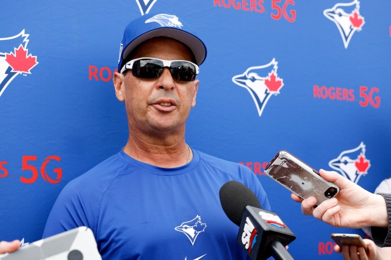 Mar 16, 2022; Dunedin, FL, USA; Toronto Blue Jays manager Charlie Montoyo (25) gives a press conference after workouts at Toronto Blue Jays Player Development Complex. Mandatory Credit: Nathan Ray Seebeck-USA TODAY Sports