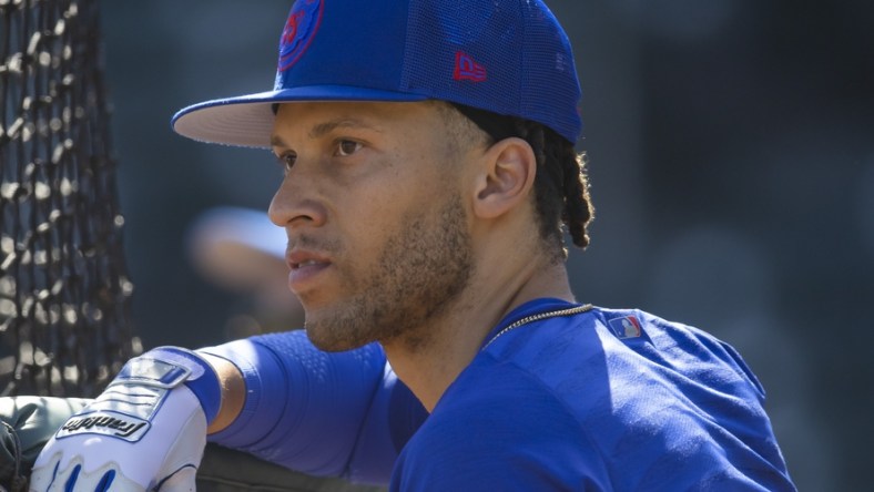 Mar 16, 2022; Mesa, AZ, USA; Chicago Cubs infielder Andrelton Simmons during spring training workouts at Sloan Park. Mandatory Credit: Mark J. Rebilas-USA TODAY Sports