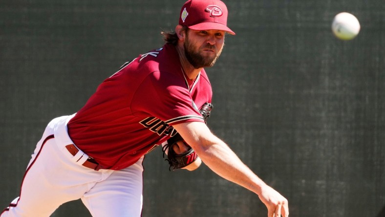 Mar 15, 2022; Scottsdale, Arizona, USA; Arizona Diamondbacks pitcher Matt Peacock throws in the bullpen during spring training at Salt River Fields.

Mlb Diamondbacks Spring Training