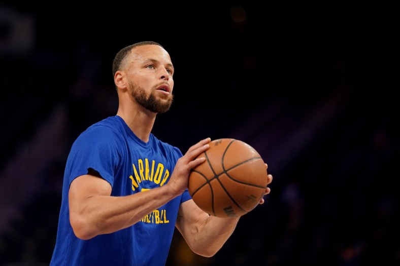 Mar 16, 2022; San Francisco, California, USA; Golden State Warriors guard Stephen Curry (30) warms up before the start of the game against the Boston Celtics at the Chase Center. Mandatory Credit: Cary Edmondson-USA TODAY Sports