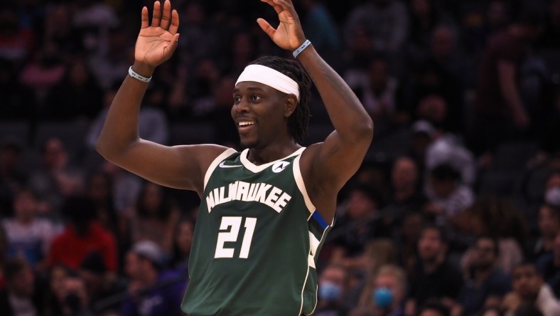 Mar 16, 2022; Sacramento, California, USA; Milwaukee Bucks guard Jrue Holiday (21) smiles between plays against the Sacramento Kings during the fourth quarter at Golden 1 Center. Mandatory Credit: Kelley L Cox-USA TODAY Sports