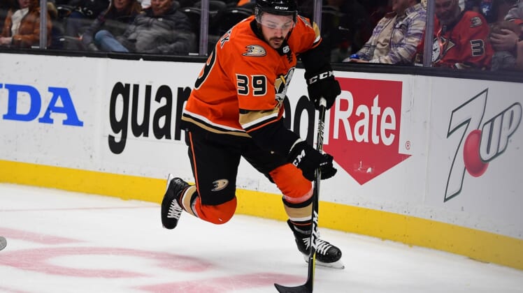 Mar 18, 2022; Anaheim, California, USA; Anaheim Ducks center Sam Carrick (39) moves the puck against the Florida Panthers during the second period at Honda Center. Mandatory Credit: Gary A. Vasquez-USA TODAY Sports