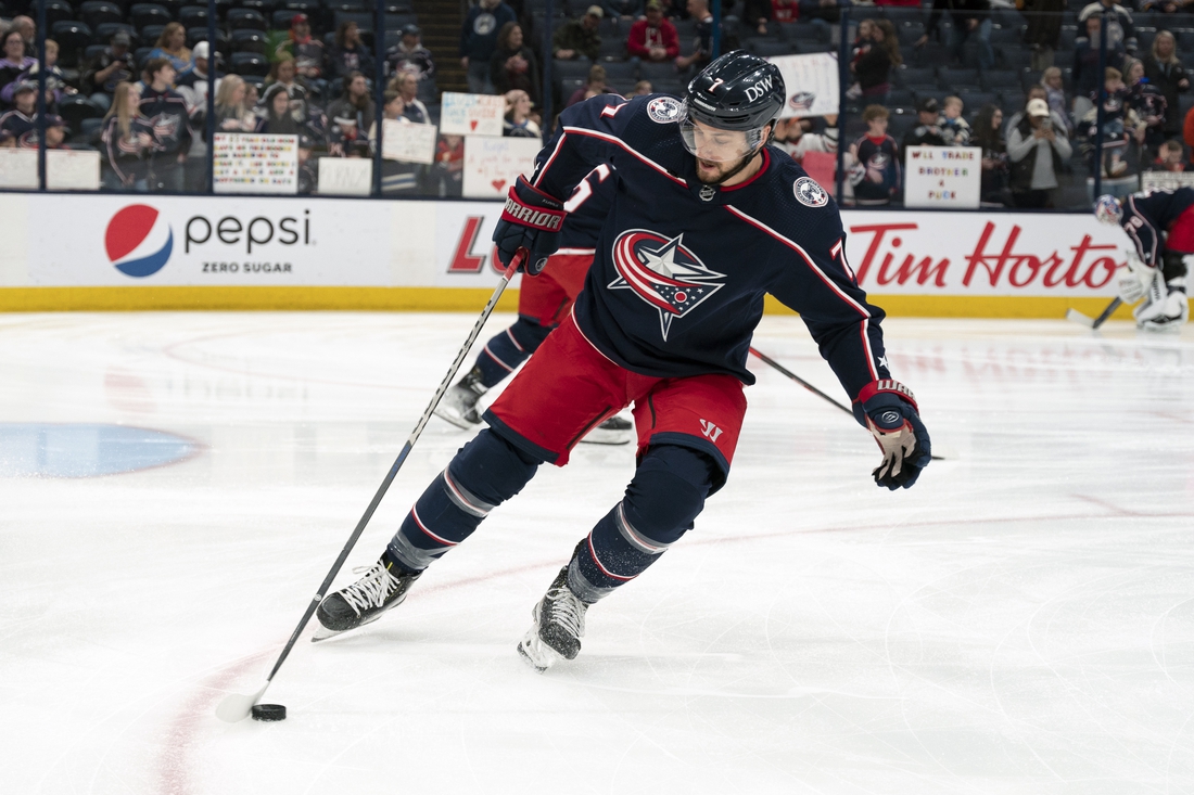 Mar 19, 2022; Columbus, Ohio, USA;  Columbus Blue Jackets center Sean Kuraly (7) skates with the puck in warm-ups prior to the game against St. Louis Blues at Nationwide Arena. Mandatory Credit: Jason Mowry-USA TODAY Sports