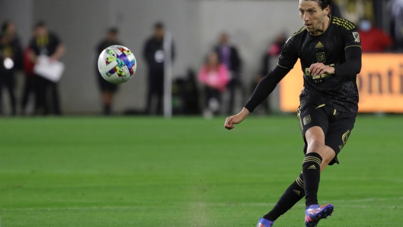 Mar 20, 2022; Los Angeles, California, USA; Los Angeles FC midfielder Ilie Sanchez (6) passes the ball during the first half against the Vancouver Whitecaps FC at Banc of California Stadium. Mandatory Credit: Kiyoshi Mio-USA TODAY Sports