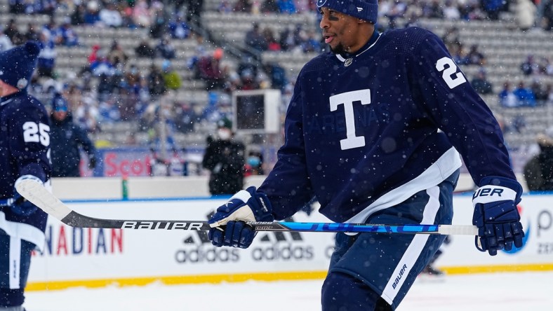 Mar 13, 2022; Hamilton, Ontario, CAN; Toronto Maple Leafs forward Wayne Simmonds (24) during warm up in the 2022 Heritage Classic ice hockey game against the Buffalo Sabres at Tim Hortons Field. Mandatory Credit: John E. Sokolowski-USA TODAY Sports