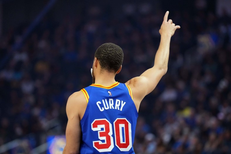 Mar 12, 2022; San Francisco, California, USA; Golden State Warriors guard Stephen Curry (30) gestures before the game against the Milwaukee Bucks at Chase Center. Mandatory Credit: Darren Yamashita-USA TODAY Sports