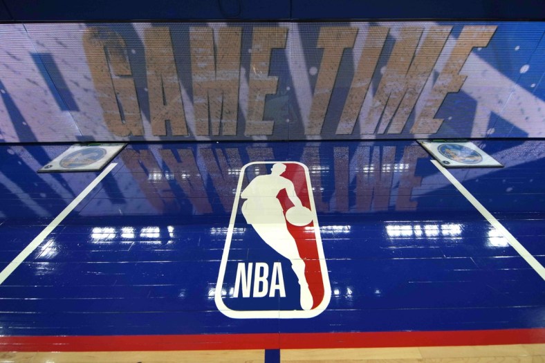 Mar 12, 2022; San Francisco, California, USA; A view of the NBA logo painted on the sideline before the game between the Golden State Warriors and the Milwaukee Bucks at Chase Center. Mandatory Credit: Darren Yamashita-USA TODAY Sports