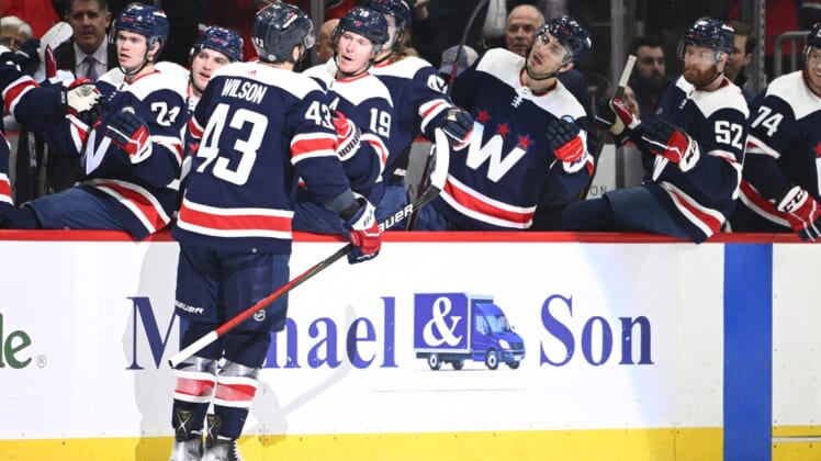 Mar 22, 2022; Washington, District of Columbia, USA; Washington Capitals right wing Tom Wilson (43) is congratulated by teammates after scoring a goal against the St. Louis Blues during the first period at Capital One Arena. Mandatory Credit: Brad Mills-USA TODAY Sports