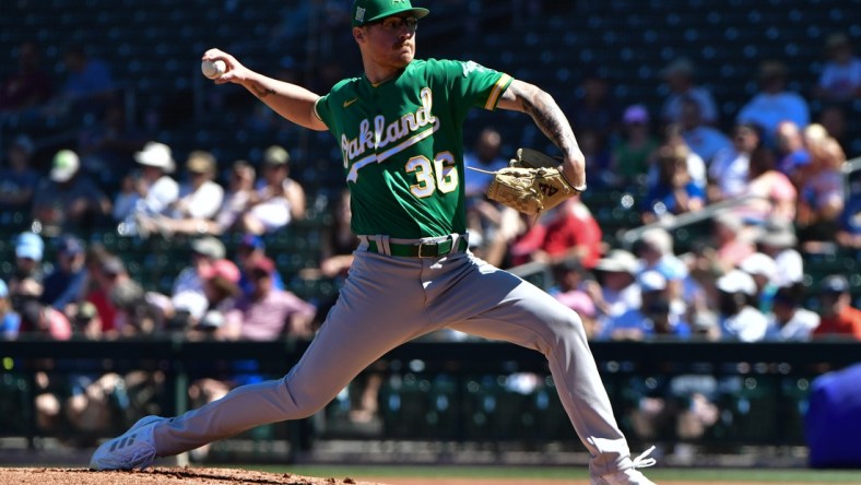 Mar 23, 2022; Mesa, Arizona, USA; Oakland Athletics relief pitcher Adam Oller (36) throws in the first inning against the Chicago Cubs during spring training at Sloan Park. Mandatory Credit: Matt Kartozian-USA TODAY Sports