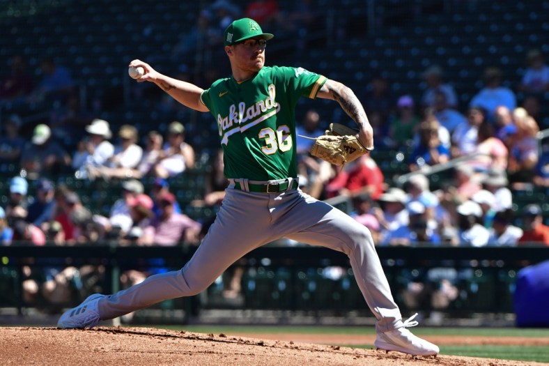 Mar 23, 2022; Mesa, Arizona, USA; Oakland Athletics relief pitcher Adam Oller (36) throws in the first inning against the Chicago Cubs during spring training at Sloan Park. Mandatory Credit: Matt Kartozian-USA TODAY Sports