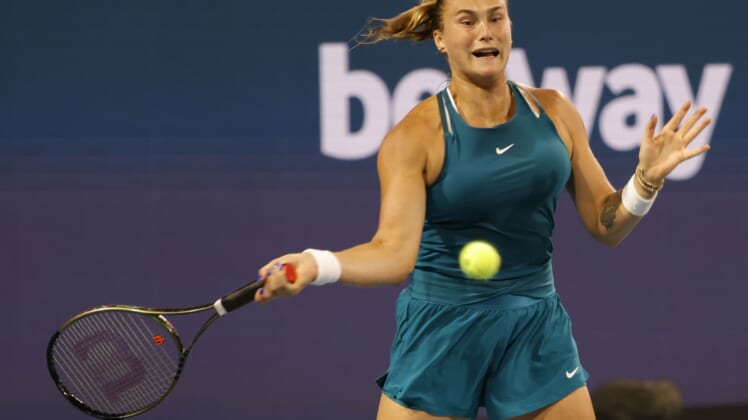 Mar 24, 2022; Miami Gardens, FL, USA; Aryna Sabalenka hits a forehand against Irina-Camelia Begu (ROU) (not pictured) in a second round women's singles match in the Miami Open at Hard Rock Stadium. Mandatory Credit: Geoff Burke-USA TODAY Sports