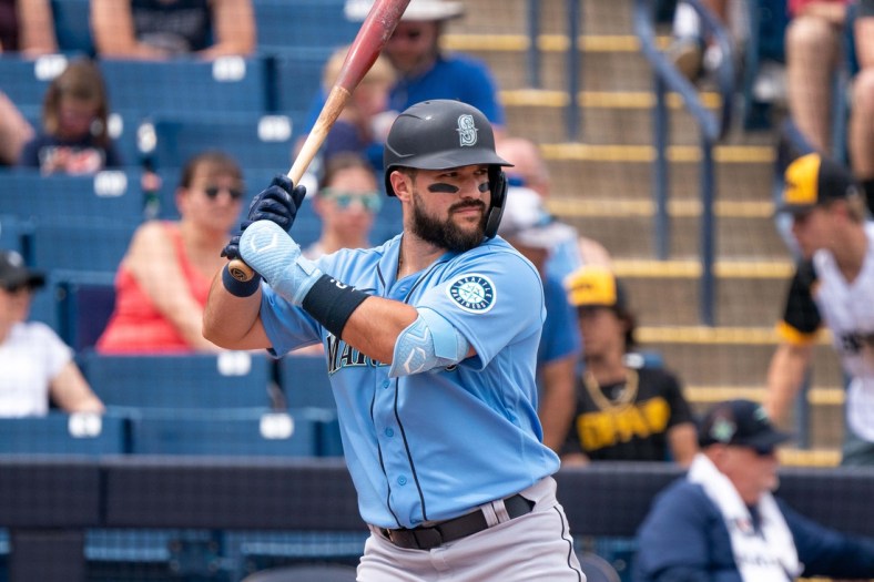 Mar 26, 2022; Phoenix, Arizona, USA; Seattle Mariners designated hitter Luis Torrens (22) at bat in the first inning during a spring training game against the Milwaukee Brewers at American Family Fields of Phoenix. Mandatory Credit: Allan Henry-USA TODAY Sports