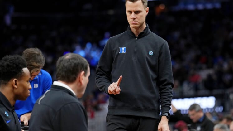 Mar 26, 2022; San Francisco, CA, USA; Duke Blue Devils associate head coach Jon Scheyer gestures to head coach Mike Krzyzewski before the game against the Arkansas Razorbacks the finals of the West regional of the men's college basketball NCAA Tournament at Chase Center. Mandatory Credit: Kelley L Cox-USA TODAY Sports