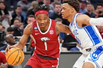Mar 26, 2022; San Francisco, CA, USA; Arkansas Razorbacks guard JD Notae (1) dribbles the ball against Duke Blue Devils forward Wendell Moore Jr. (0) during the second half in the finals of the West regional of the men's college basketball NCAA Tournament at Chase Center. Mandatory Credit: Kyle Terada-USA TODAY Sports