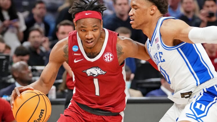 Mar 26, 2022; San Francisco, CA, USA; Arkansas Razorbacks guard JD Notae (1) dribbles the ball against Duke Blue Devils forward Wendell Moore Jr. (0) during the second half in the finals of the West regional of the men's college basketball NCAA Tournament at Chase Center. Mandatory Credit: Kyle Terada-USA TODAY Sports