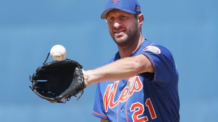 Mar 27, 2022; Port St. Lucie, Florida, USA; New York Mets starting pitcher Max Scherzer (21) warms up before the sixth inning of a spring training game against the St. Louis Cardinals at Clover Park. Mandatory Credit: Reinhold Matay-USA TODAY Sports