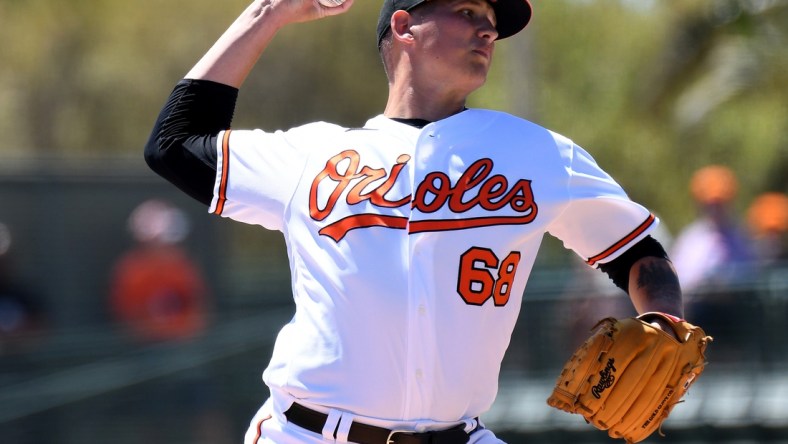 Mar 21, 2022; Sarasota, Florida, USA; Baltimore Orioles pitcher Tyler Wells (68) throws a pitch in the first inning of the game against the Minnesota Twins during spring training at Ed Smith Stadium. Mandatory Credit: Jonathan Dyer-USA TODAY Sports