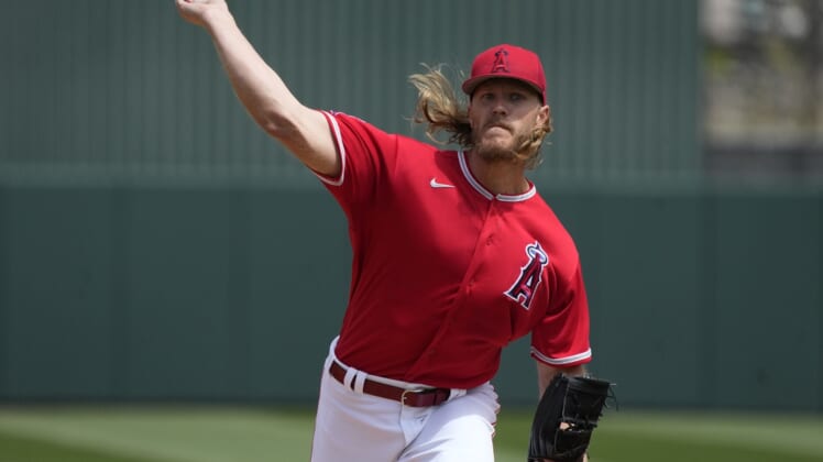 Mar 28, 2022; Tempe, Arizona, USA; Los Angeles Angels starting pitcher Noah Syndergaard (34) throws against the Oakland Athletics during a spring training game at Tempe Diablo Stadium. Mandatory Credit: Rick Scuteri-USA TODAY Sports