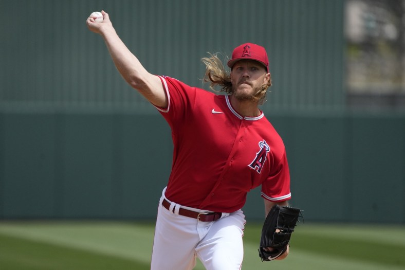 Mar 28, 2022; Tempe, Arizona, USA; Los Angeles Angels starting pitcher Noah Syndergaard (34) throws against the Oakland Athletics during a spring training game at Tempe Diablo Stadium. Mandatory Credit: Rick Scuteri-USA TODAY Sports