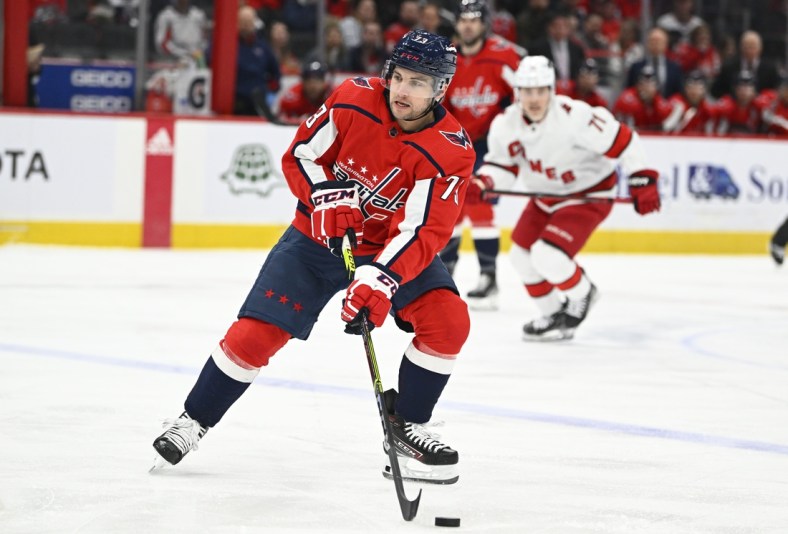 Mar 28, 2022; Washington, District of Columbia, USA; Washington Capitals left wing Conor Sheary (73) handles the puck against the Carolina Hurricanes during the first period at Capital One Arena. Mandatory Credit: Brad Mills-USA TODAY Sports