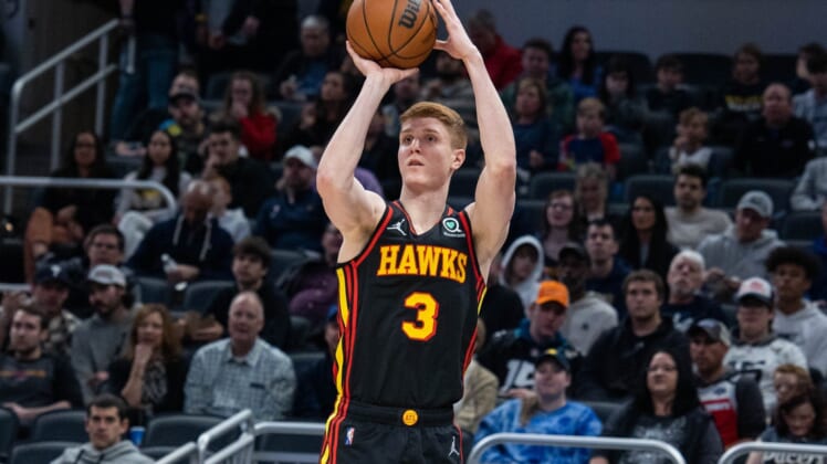 Mar 28, 2022; Indianapolis, Indiana, USA;  Atlanta Hawks guard Kevin Huerter (3) shoots the ball in the first half against the Indiana Pacers at Gainbridge Fieldhouse. Mandatory Credit: Trevor Ruszkowski-USA TODAY Sports