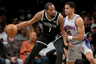 Mar 29, 2022; Brooklyn, New York, USA; Brooklyn Nets forward Kevin Durant (7) controls the ball against Detroit Pistons guard Frank Jackson (5) during the second quarter at Barclays Center. Mandatory Credit: Brad Penner-USA TODAY Sports