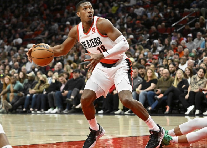 Mar 30, 2022; Portland, Oregon, USA; Portland Trail Blazers guard Kris Dunn (18) drives to the basket during the second half against the New Orleans Pelicans at Moda Center. The Pelicans won the game 117-107. Mandatory Credit: Troy Wayrynen-USA TODAY Sports