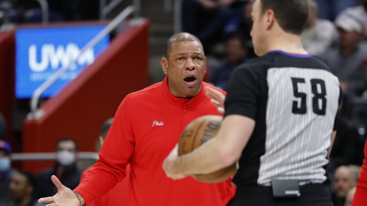 Mar 31, 2022; Detroit, Michigan, USA;  Philadelphia 76ers head coach Doc Rivers reacts at referee Josh Tiven (58) after a call during the second half against the Detroit Pistons at Little Caesars Arena. Mandatory Credit: Rick Osentoski-USA TODAY Sports