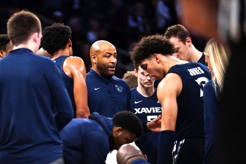 Mar 31, 2022; New York, New York, USA; Xavier Musketeers interim head coach Jonas Hayes speaks to his players at a break during the first half of the NIT college basketball finals against the Texas A&M Aggies at Madison Square Garden. Mandatory Credit: Gregory Fisher-USA TODAY Sports