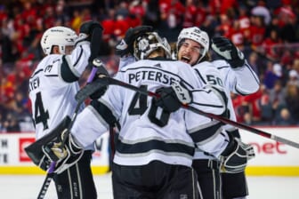 Mar 31, 2022; Calgary, Alberta, CAN; Los Angeles Kings goaltender Cal Petersen (40) celebrate win with teammates against the Calgary Flames at Scotiabank Saddledome. Mandatory Credit: Sergei Belski-USA TODAY Sports