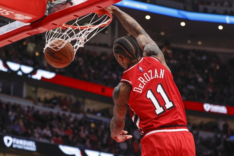 Mar 31, 2022; Chicago, Illinois, USA; Chicago Bulls forward DeMar DeRozan (11) dunks the ball against the LA Clippers during the second half at United Center. Mandatory Credit: Kamil Krzaczynski-USA TODAY Sports