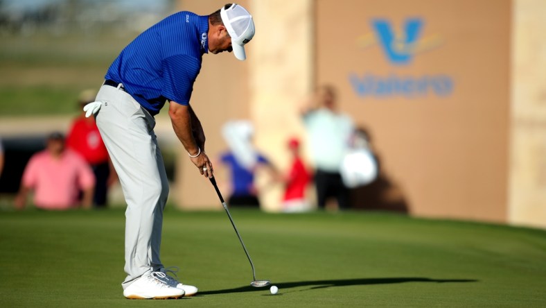 Apr 1, 2022; San Antonio, Texas, USA; Ryan Palmer putts on the 18th hole during the second round of the Valero Texas Open golf tournament. Mandatory Credit: Erik Williams-USA TODAY Sports