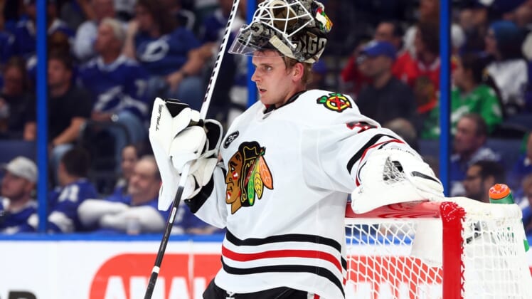 Apr 1, 2022; Tampa, Florida, USA; Chicago Blackhawks goaltender Kevin Lankinen (32) looks on against the Tampa Bay Lightning during the first period at Amalie Arena. Mandatory Credit: Kim Klement-USA TODAY Sports