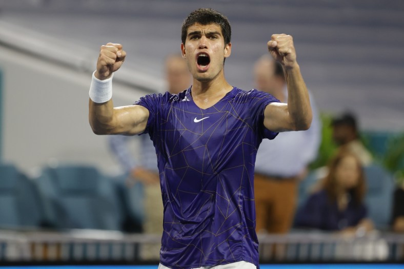 Apr 1, 2022; Miami Gardens, FL, USA; Carlos Alcaraz (ESP) salutes the crowd after his match against Hubert Hurkacz (POL)(not pictured) in a men's singles semifinal in the Miami Open at Hard Rock Stadium. Mandatory Credit: Geoff Burke-USA TODAY Sports