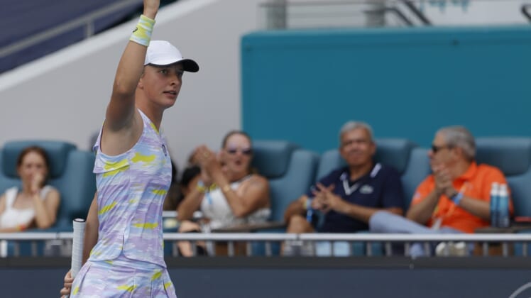 Apr 2, 2022; Miami Gardens, FL, USA;  Iga Swiatek (POL) reacts after a breaking serve against Naomi Osaka (JPN)(not pictured) in the women's singles final in the Miami Open at Hard Rock Stadium. Mandatory Credit: Geoff Burke-USA TODAY Sports