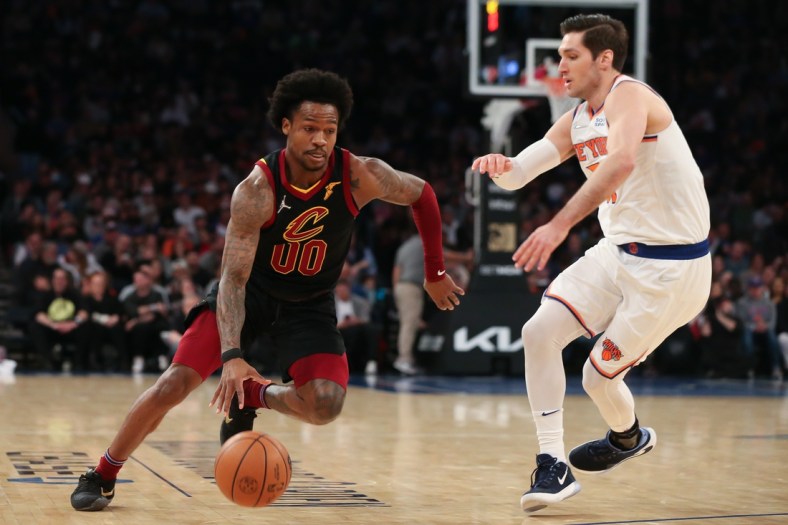 Apr 2, 2022; New York, New York, USA; Cleveland Cavaliers guard Brandon Goodwin (00) dribbles the ball past New York Knicks guard Ryan Arcidiacono (51) during the second quarter at Madison Square Garden. Mandatory Credit: Tom Horak-USA TODAY Sports