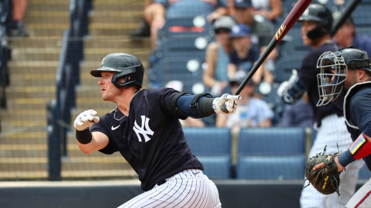 Apr 2, 2022; Tampa, Florida, USA; New York Yankees third baseman Josh Donaldson (28) hits a RBI single during the second inning against the Atlanta Braves during spring training at George M. Steinbrenner Field. Mandatory Credit: Kim Klement-USA TODAY Sports
