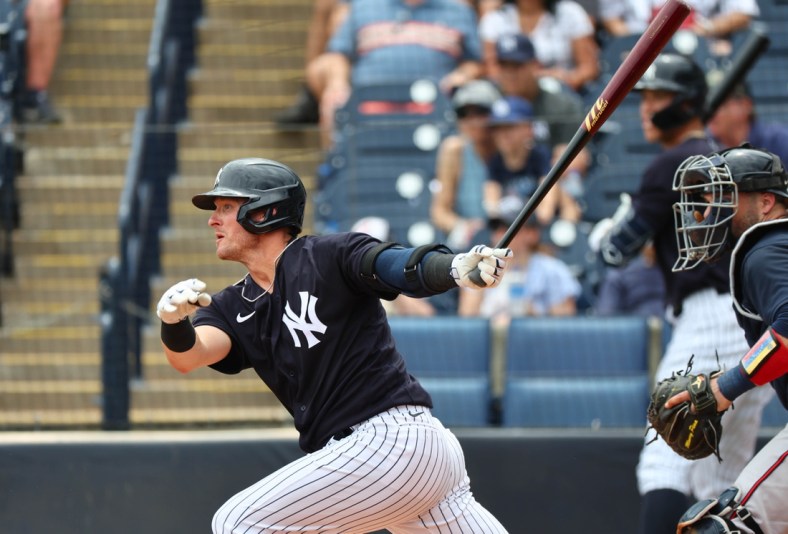 Apr 2, 2022; Tampa, Florida, USA; New York Yankees third baseman Josh Donaldson (28) hits a RBI single during the second inning against the Atlanta Braves during spring training at George M. Steinbrenner Field. Mandatory Credit: Kim Klement-USA TODAY Sports