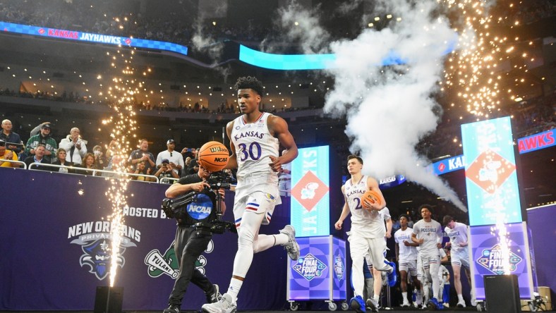 Apr 2, 2022; New Orleans, LA, USA; Kansas Jayhawks guard Ochai Agbaji (30) leads his team to the court before the game against the Villanova Wildcats during the 2022 NCAA men's basketball tournament Final Four semifinals at Caesars Superdome. Mandatory Credit: Bob Donnan-USA TODAY Sports