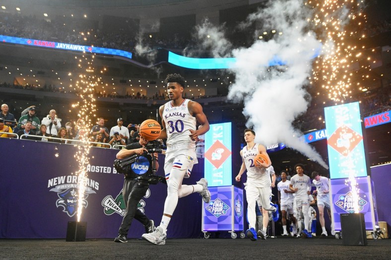 Apr 2, 2022; New Orleans, LA, USA; Kansas Jayhawks guard Ochai Agbaji (30) leads his team to the court before the game against the Villanova Wildcats during the 2022 NCAA men's basketball tournament Final Four semifinals at Caesars Superdome. Mandatory Credit: Bob Donnan-USA TODAY Sports